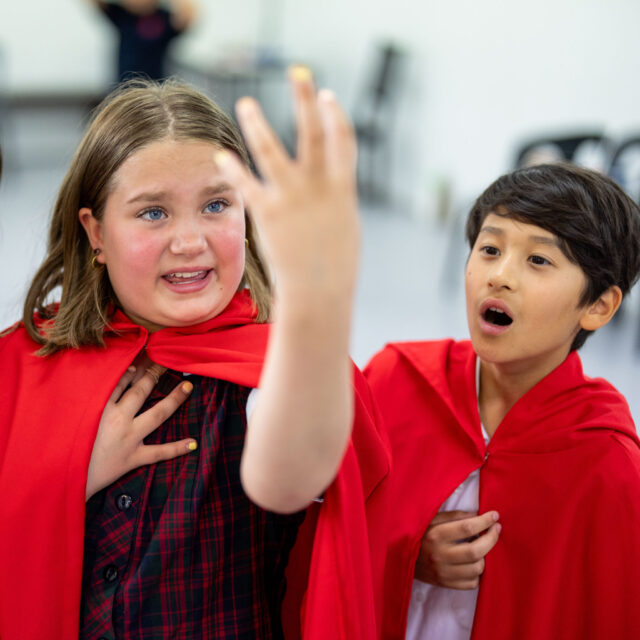 MCD students perform as actors during drama class in school